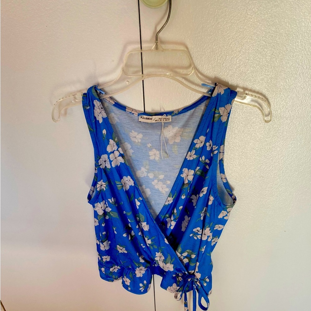 Sleeveless side tie blouse